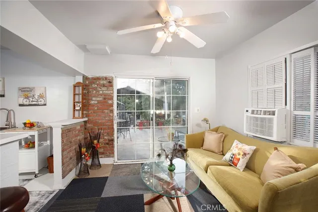 a view of storage and utility room with washer and dryer