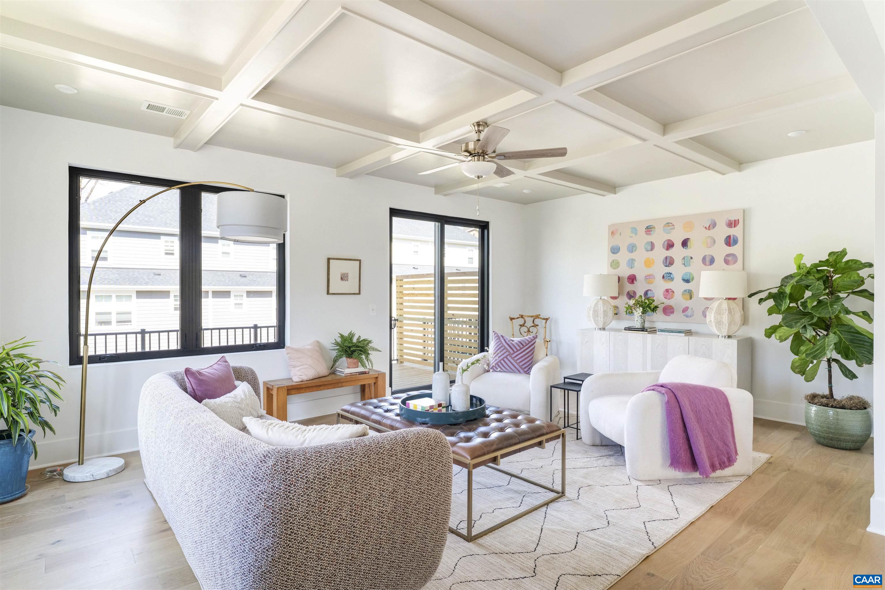 983 5th Street Southwest Charlottesville, VA 22903 - Photo 11 of 33 a living room with furniture and flowers