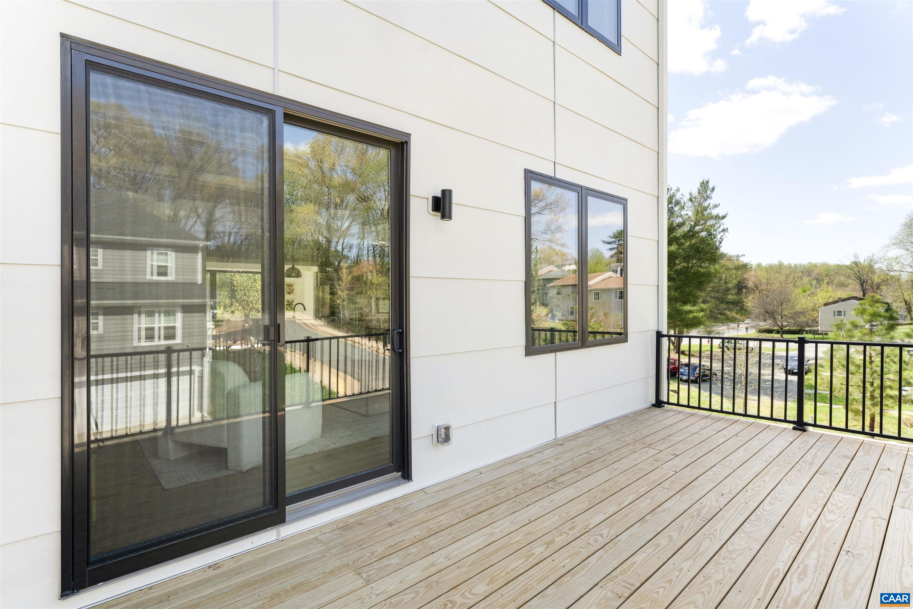 983 5th Street Southwest Charlottesville, VA 22903 - Photo 13 of 33 a view of a balcony with wooden floor
