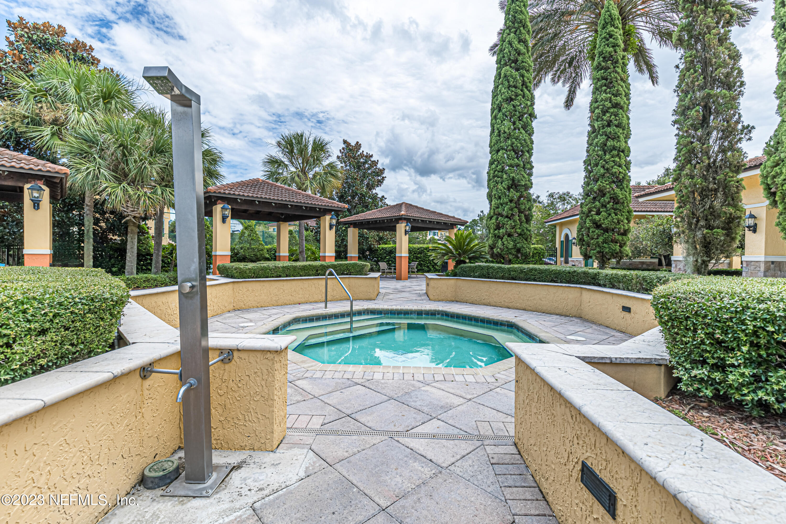 9745 Touchton Road, Unit 1105 Jacksonville, FL 32246 - Photo 37 of 64 a view of a swimming pool with a patio