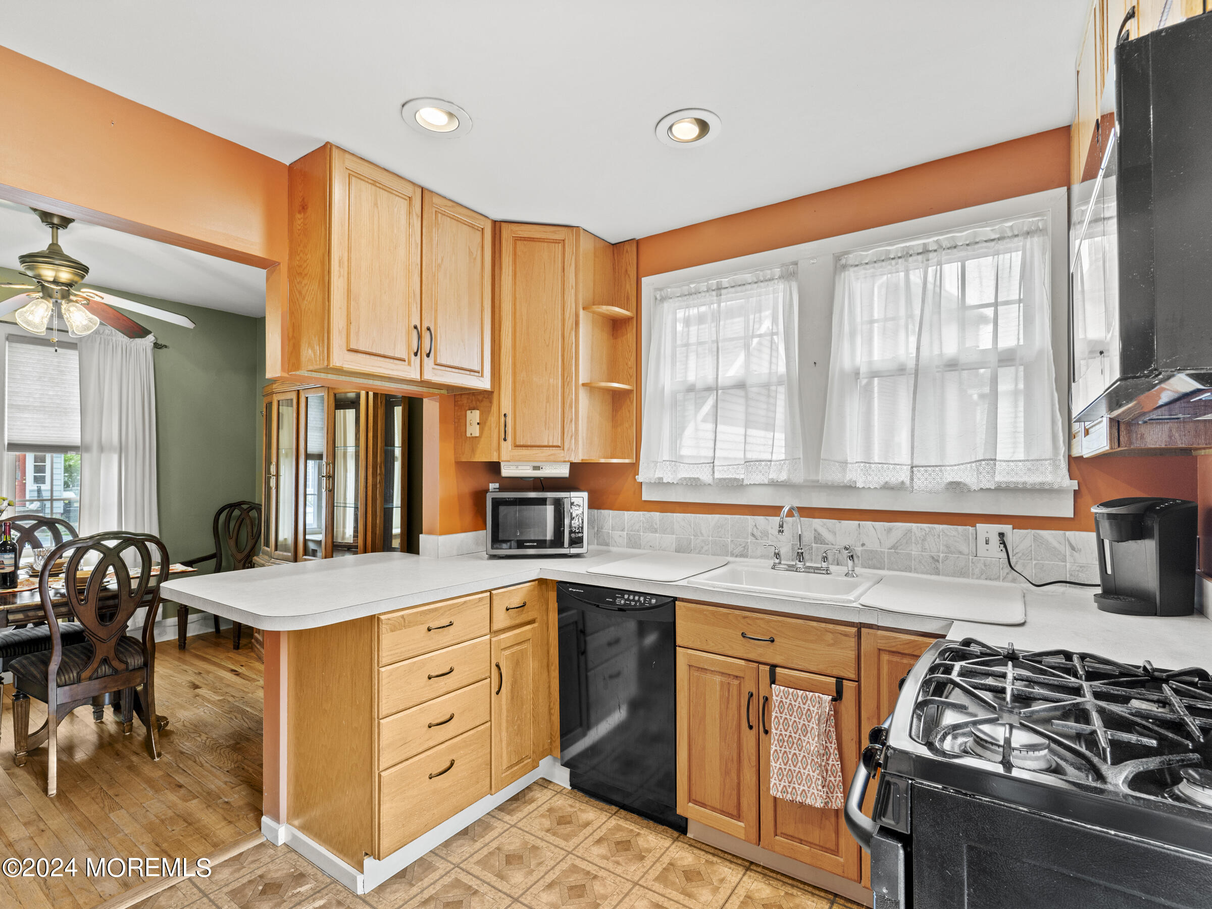 150 State Street Bloomfield, NJ 07003 - Photo 11 of 30 a kitchen with stainless steel appliances granite countertop a stove a sink and a refrigerator