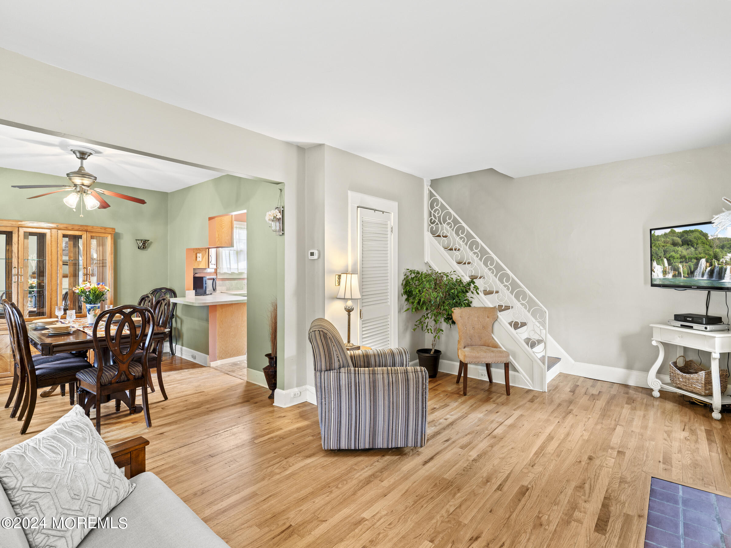 150 State Street Bloomfield, NJ 07003 - Photo 13 of 30 a living room with furniture and wooden floor