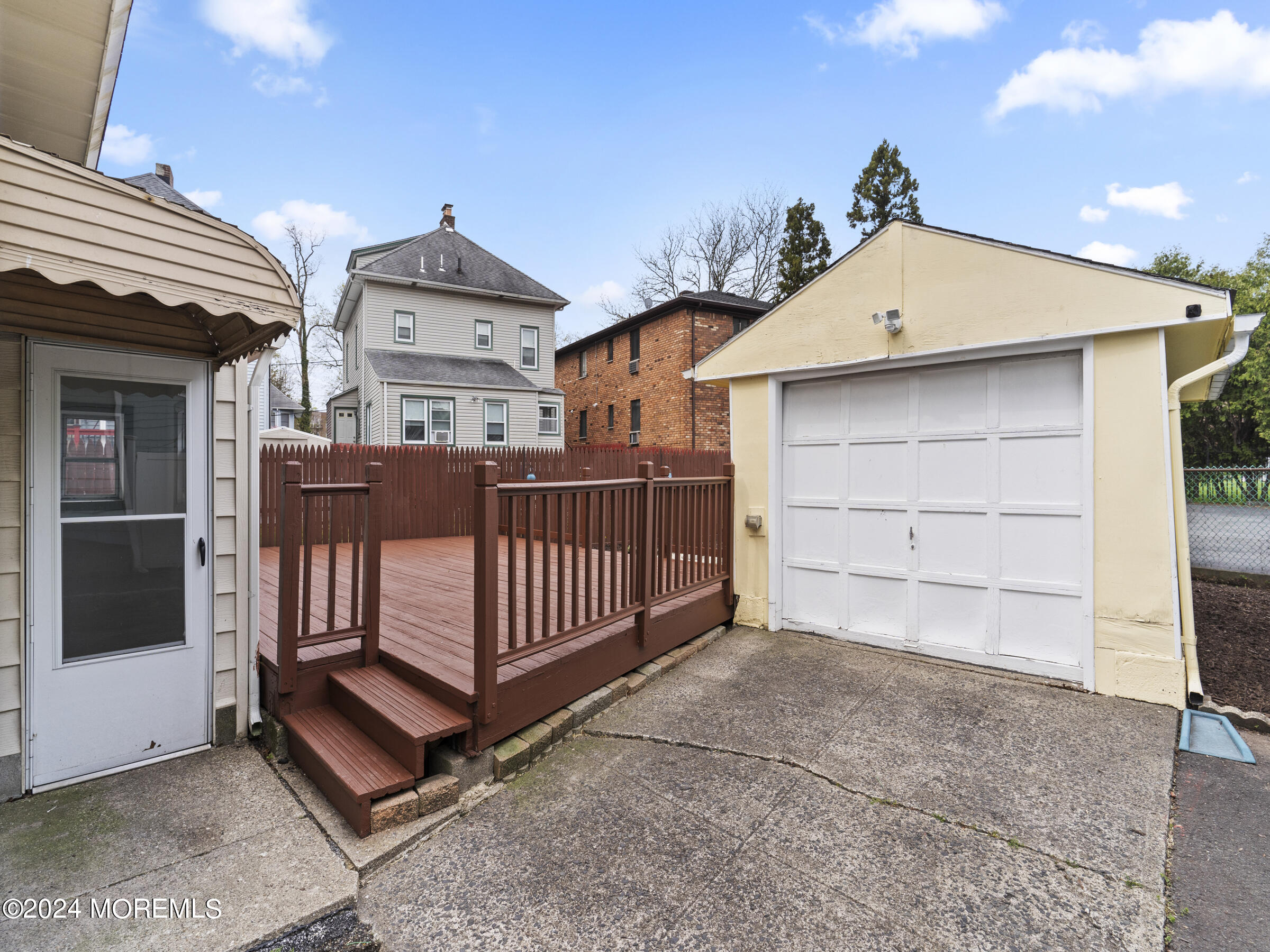 150 State Street Bloomfield, NJ 07003 - Photo 26 of 30 a view of a house with a wooden fence