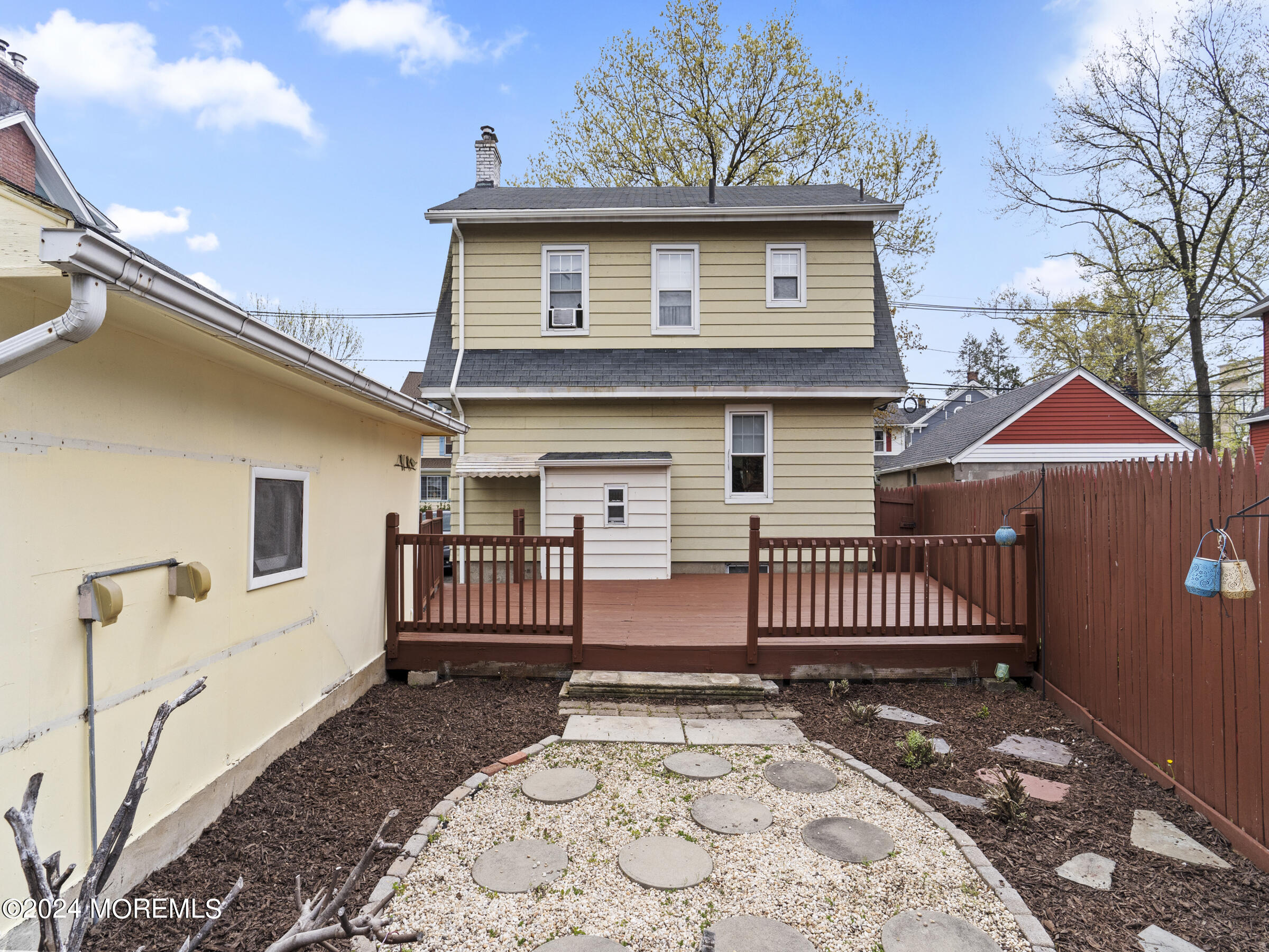 150 State Street Bloomfield, NJ 07003 - Photo 28 of 30 a view of a house with a wooden deck