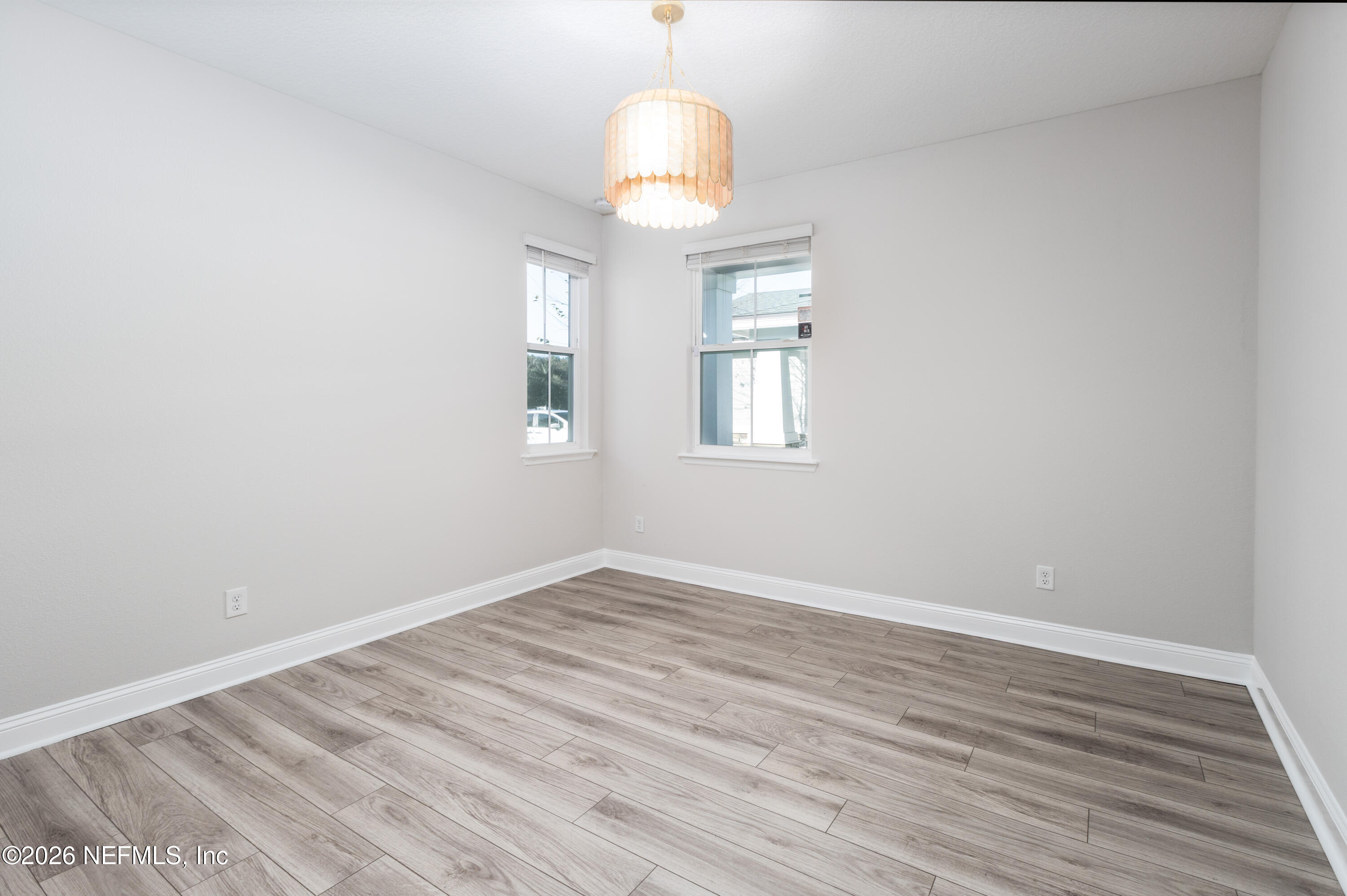 305 Kellet Way St. Johns, FL 32259 - Photo 19 of 42 wooden floor in an empty room with a window