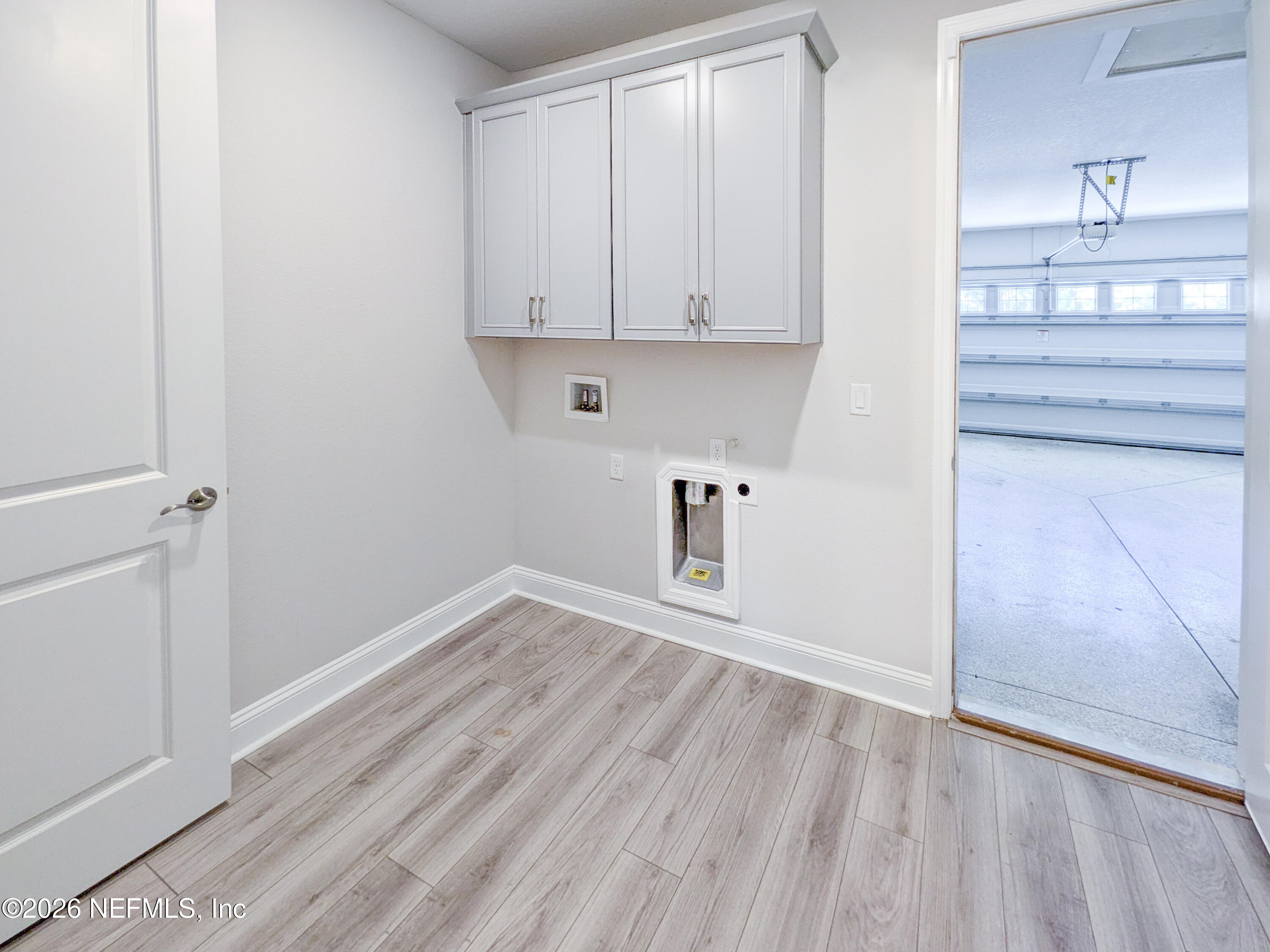 305 Kellet Way St. Johns, FL 32259 - Photo 22 of 42 a view of kitchen and wooden floor