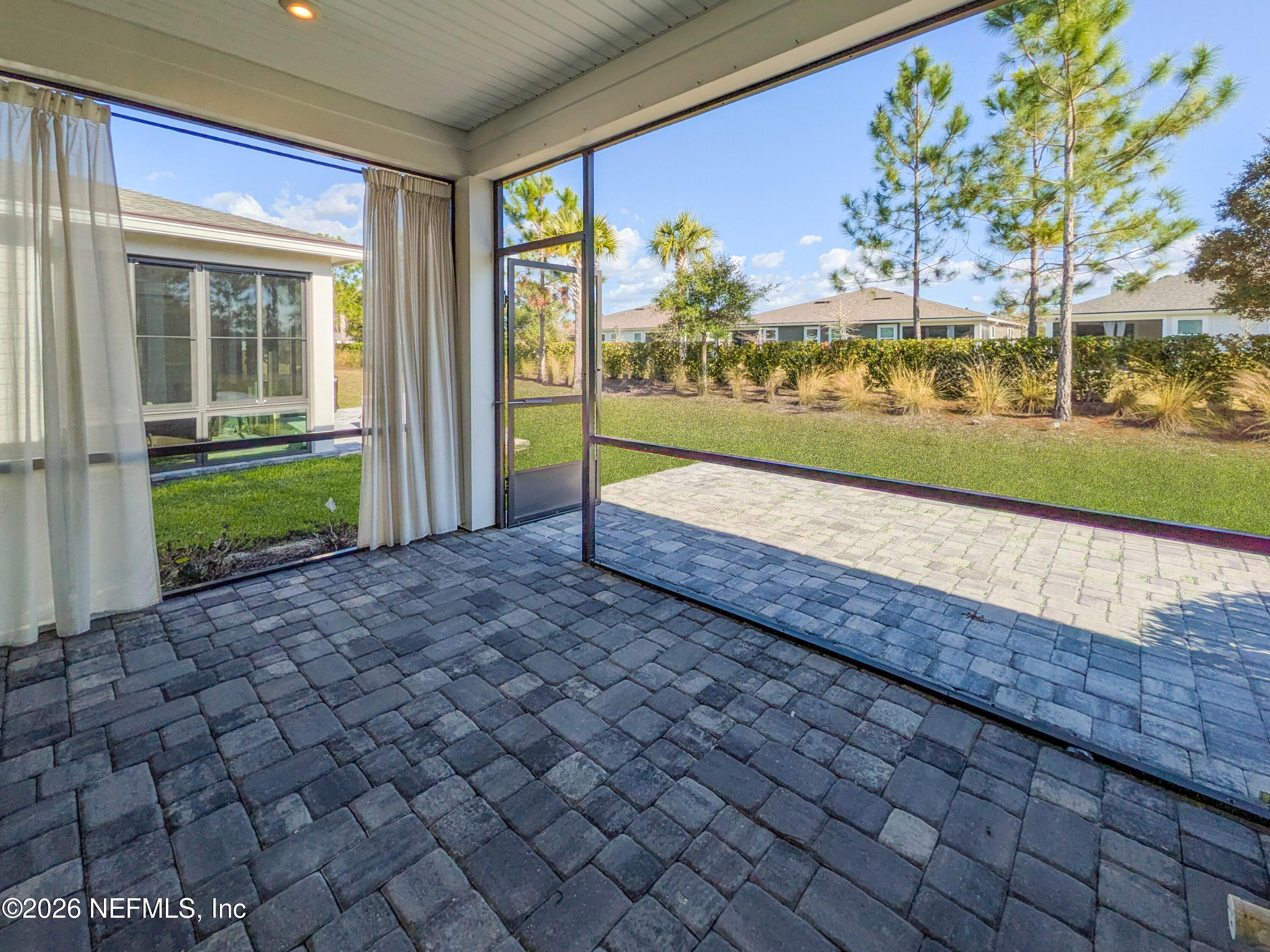 305 Kellet Way St. Johns, FL 32259 - Photo 24 of 42 a view of swimming pool with a outdoor seating