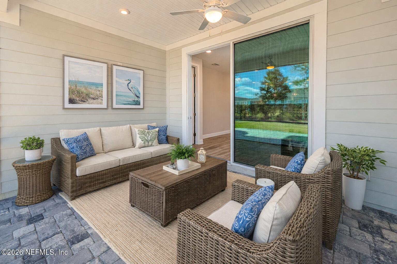 305 Kellet Way St. Johns, FL 32259 - Photo 25 of 42 a living room with furniture and a potted plant