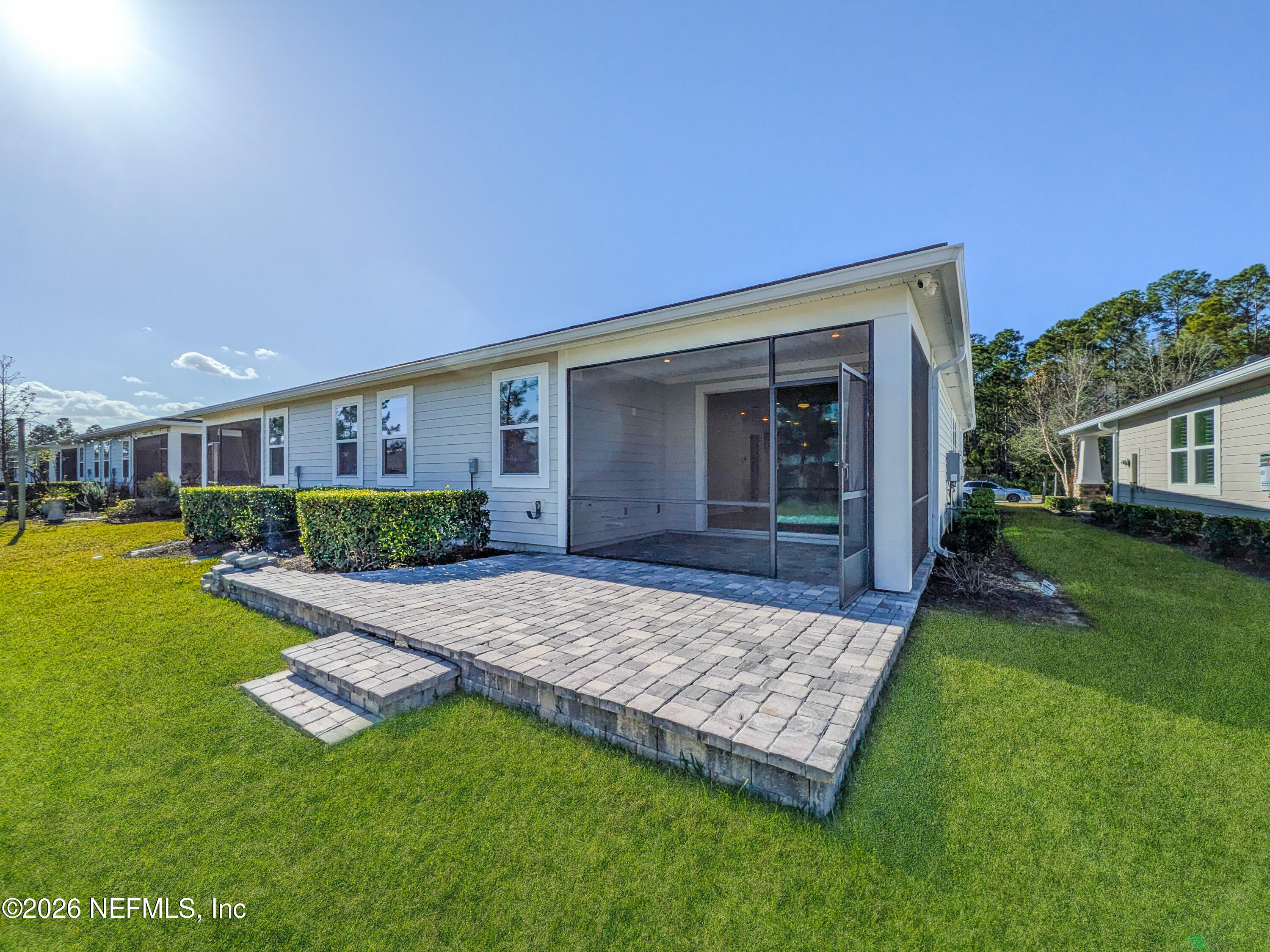 305 Kellet Way St. Johns, FL 32259 - Photo 29 of 42 a view of a backyard with plants and patio