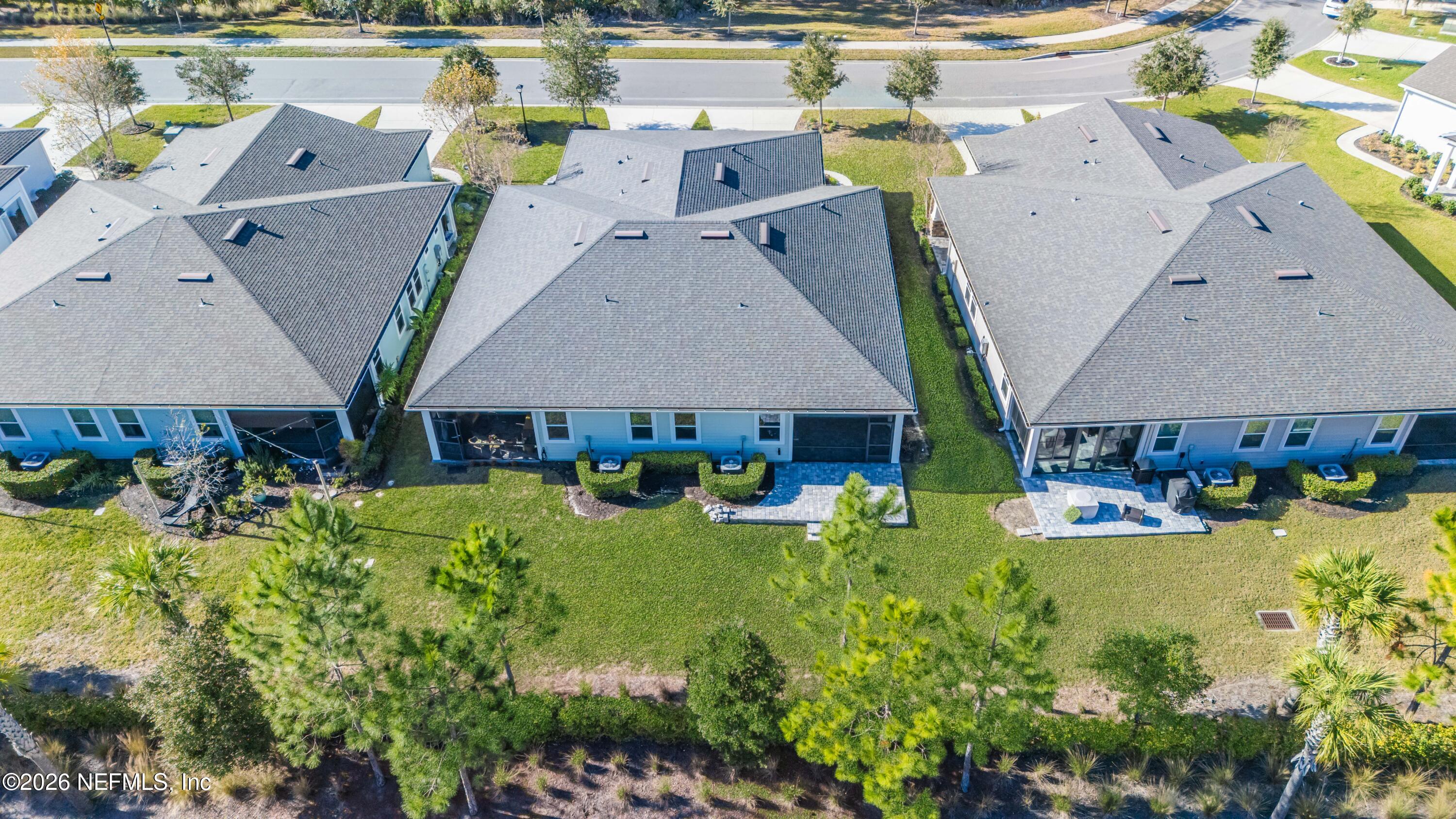 305 Kellet Way St. Johns, FL 32259 - Photo 33 of 42 an aerial view of multiple houses with yard