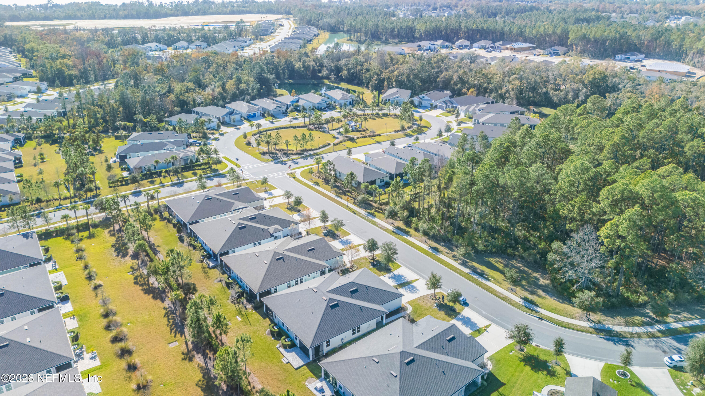 305 Kellet Way St. Johns, FL 32259 - Photo 34 of 42 an aerial view of lake and residential houses with outdoor space