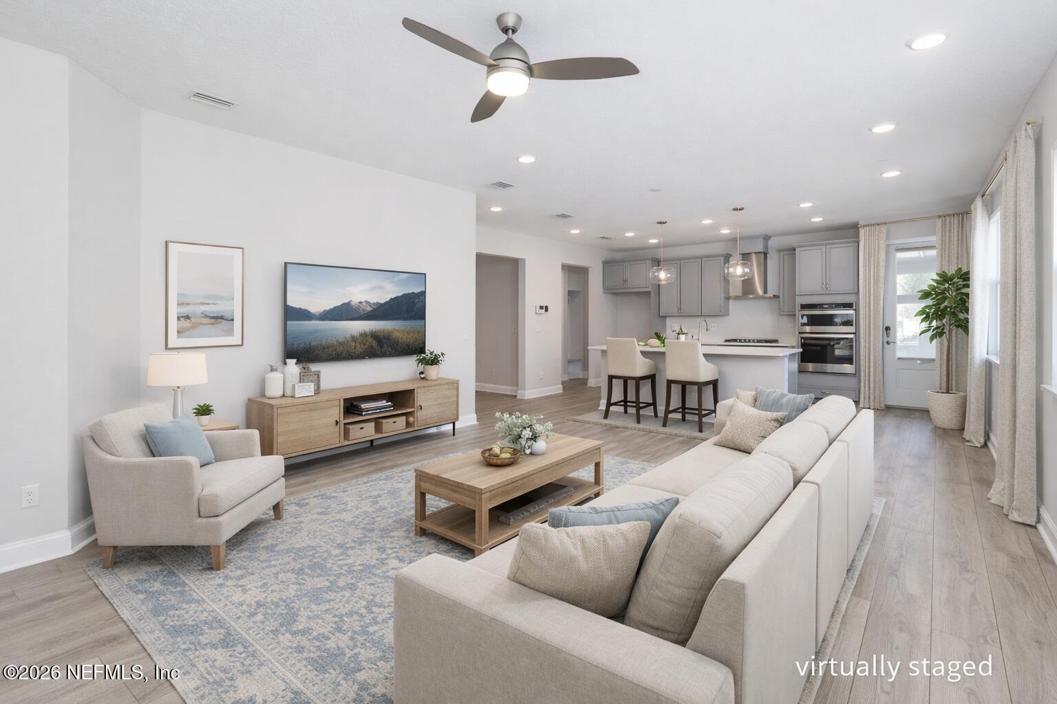 305 Kellet Way St. Johns, FL 32259 - Photo 4 of 42 a living room with furniture and a flat screen tv