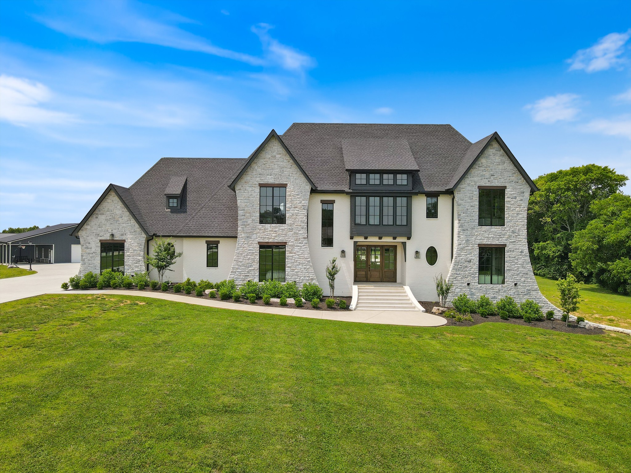 2996 South Rutland Road Mount Juliet, TN 37122 - Photo 2 of 88 a front view of house with yard and green space