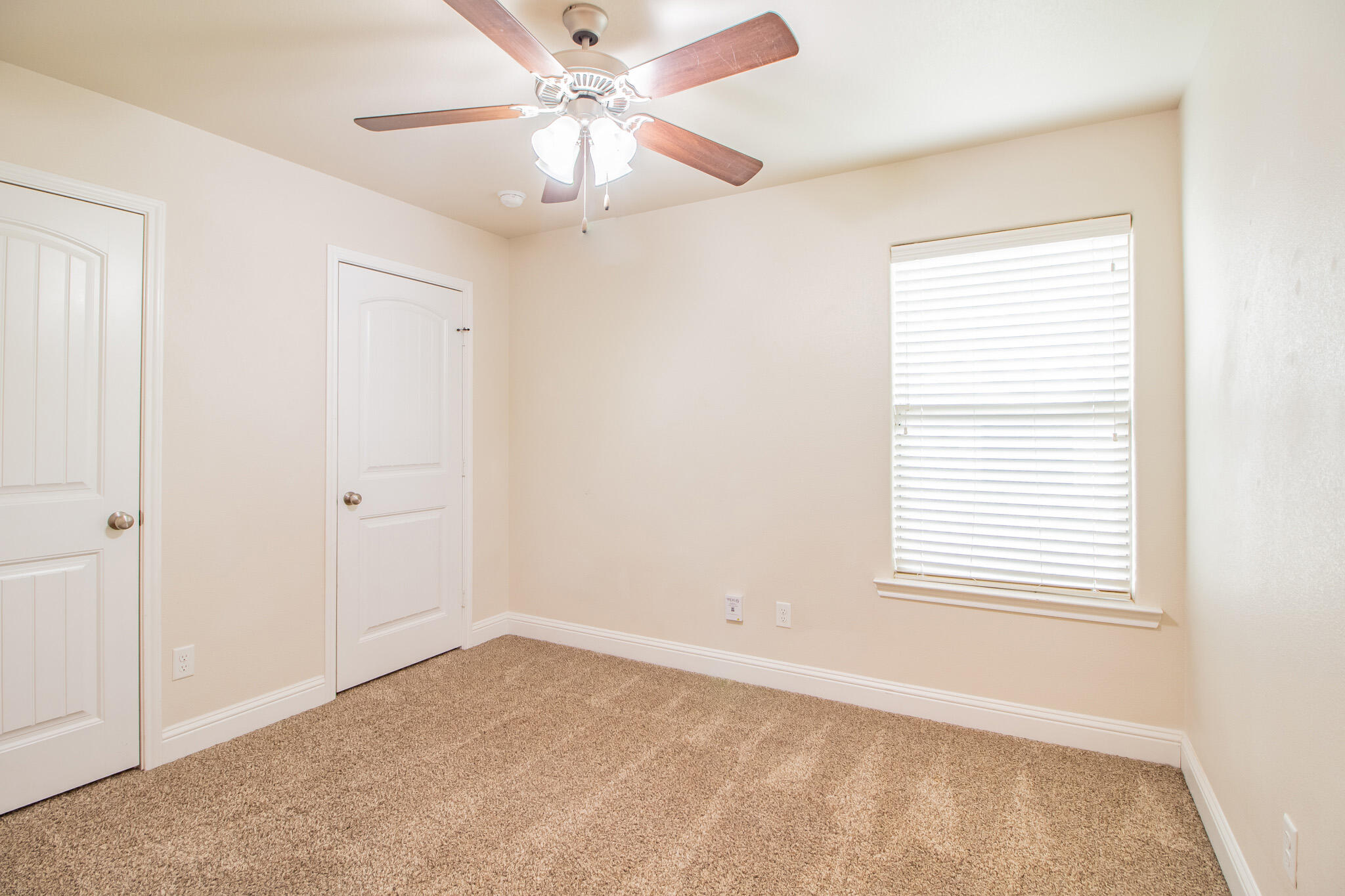 7409 101st Street Lubbock, TX 79424 - Photo 16 of 22 a view of an empty room with a window