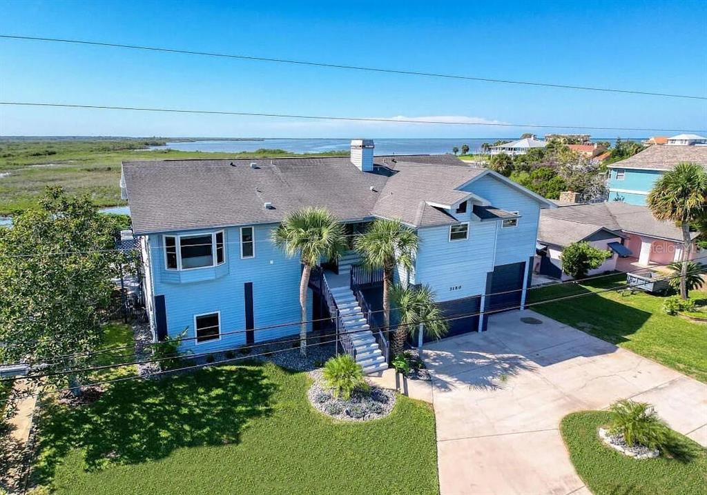 3180 Gulfview Drive Hernando Beach, FL 34607 - Photo 1 of 1 a aerial view of a house with a yard