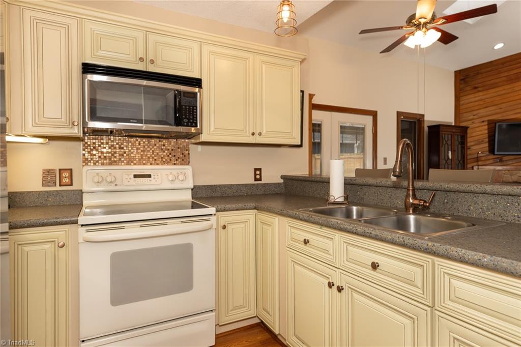 4204 Sunburst Drive High Point, NC 27265 - Photo 13 of 44 Cute kitchen with lots of cabinet and counter space