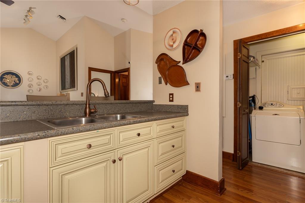 4204 Sunburst Drive High Point, NC 27265 - Photo 15 of 44 Laundry is conveniently located adjacent to the kitchen