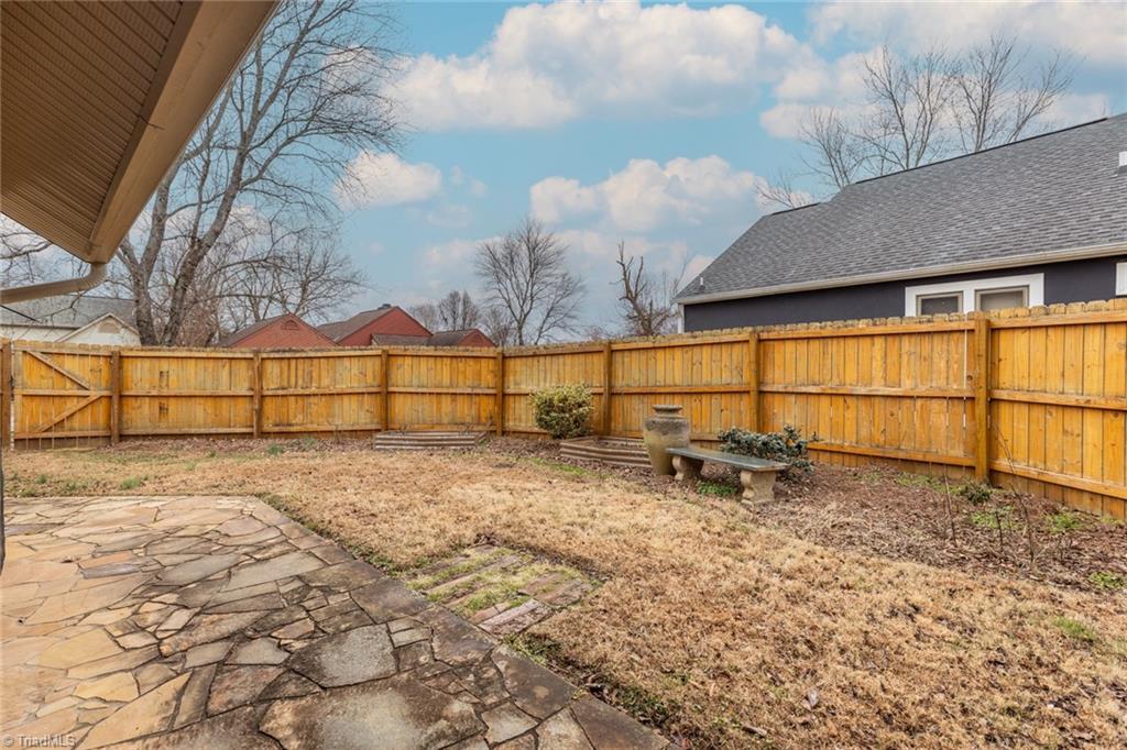 4204 Sunburst Drive High Point, NC 27265 - Photo 6 of 44 Fenced rear yard has lots of room for gardening