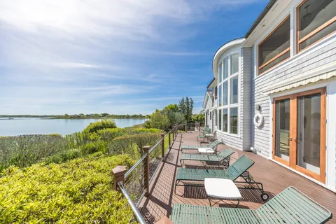 a view of a lake with a big yard