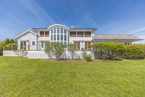 a view of lake with green space