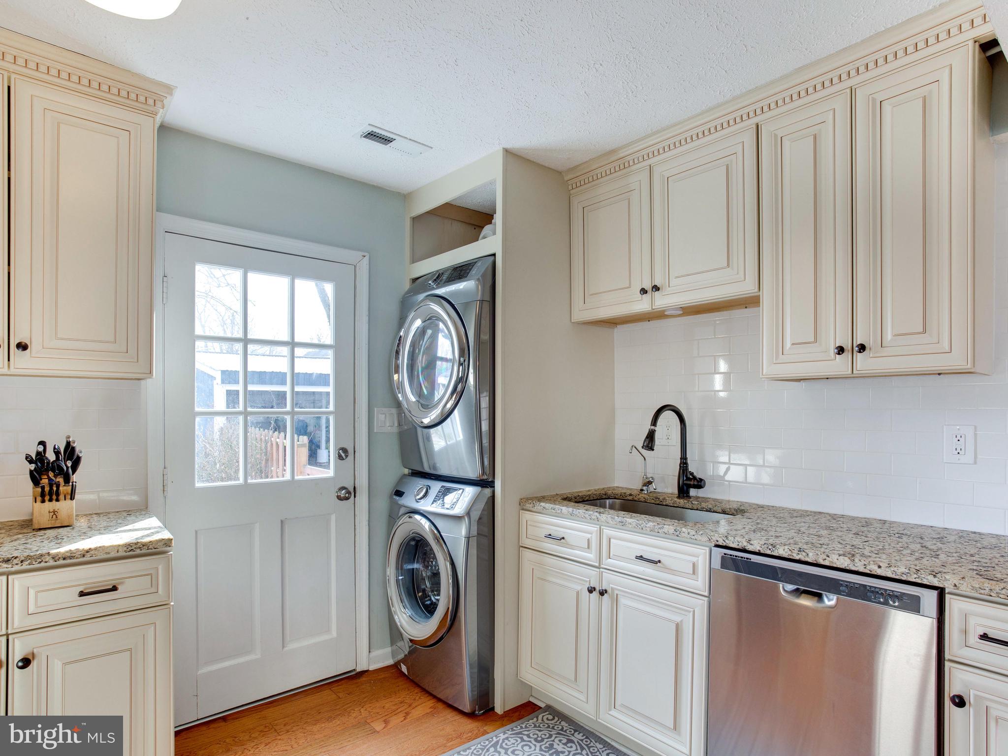 2909 Main Street Edgewater, MD 21037 - Photo 6 of 33 Granite countertops and stainless appliances.