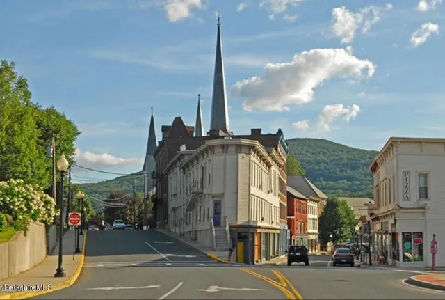 a view of a street in front of a building