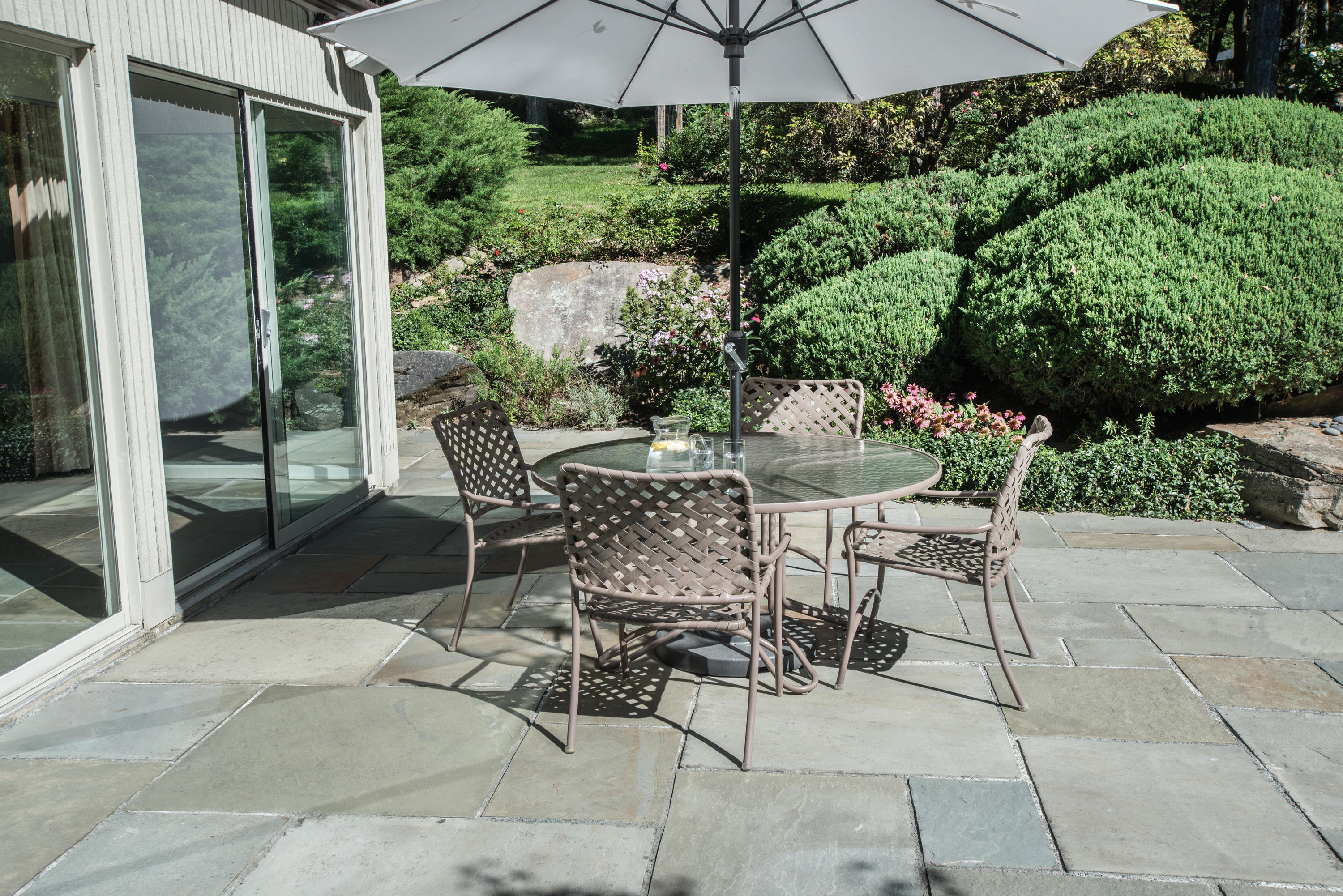 46 Chalburn Road Redding, CT 06896 - Photo 27 of 39 a view of an outdoor space with a patio