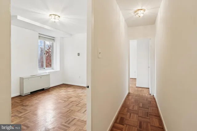 a view of a hallway view with windows