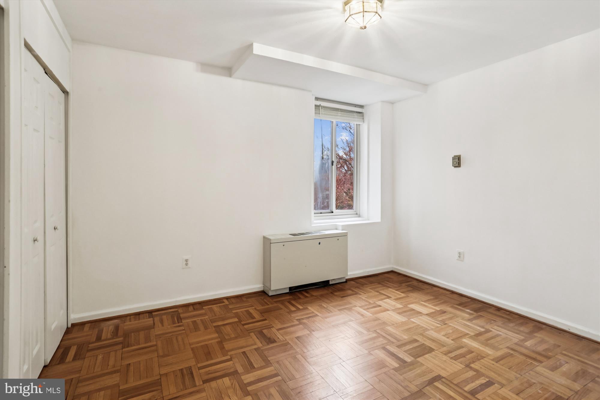 4000 Tunlaw Road Northwest, Unit 619 Washington, DC 20007 - Photo 15 of 39 an empty room with windows
