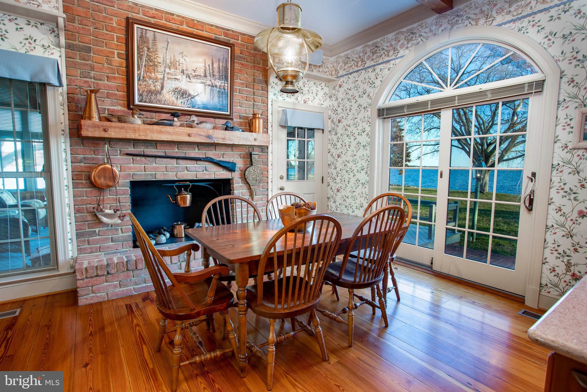 26107 Goose Neck Road Royal Oak, MD 21662 - Photo 13 of 50 breakfast room with brick fireplace