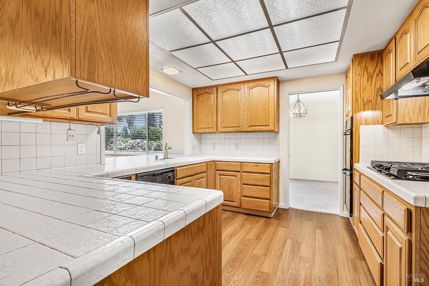 138 Oak Shadow Drive Santa Rosa, CA 95409 - Photo 19 of 50 a kitchen with stainless steel appliances granite countertop a sink and cabinets