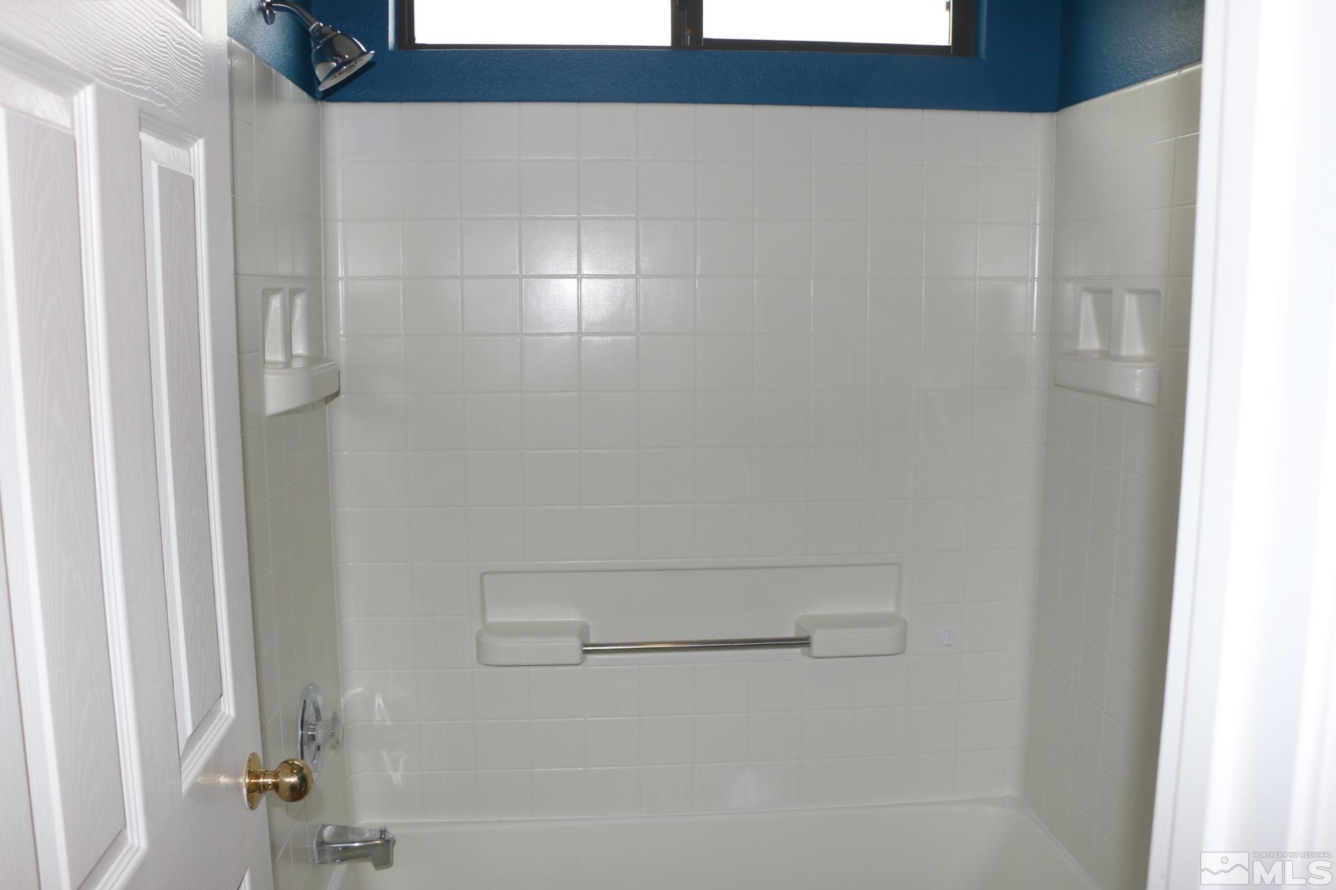 5330 Butterfly Court Reno, NV 89523 - Photo 20 of 34 a bathroom with a shower