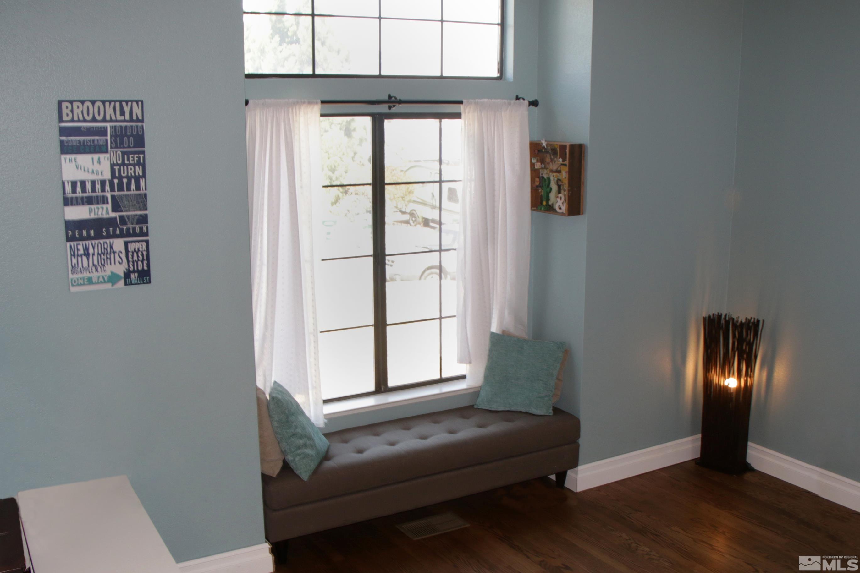 5330 Butterfly Court Reno, NV 89523 - Photo 5 of 34 a living room with furniture and a window