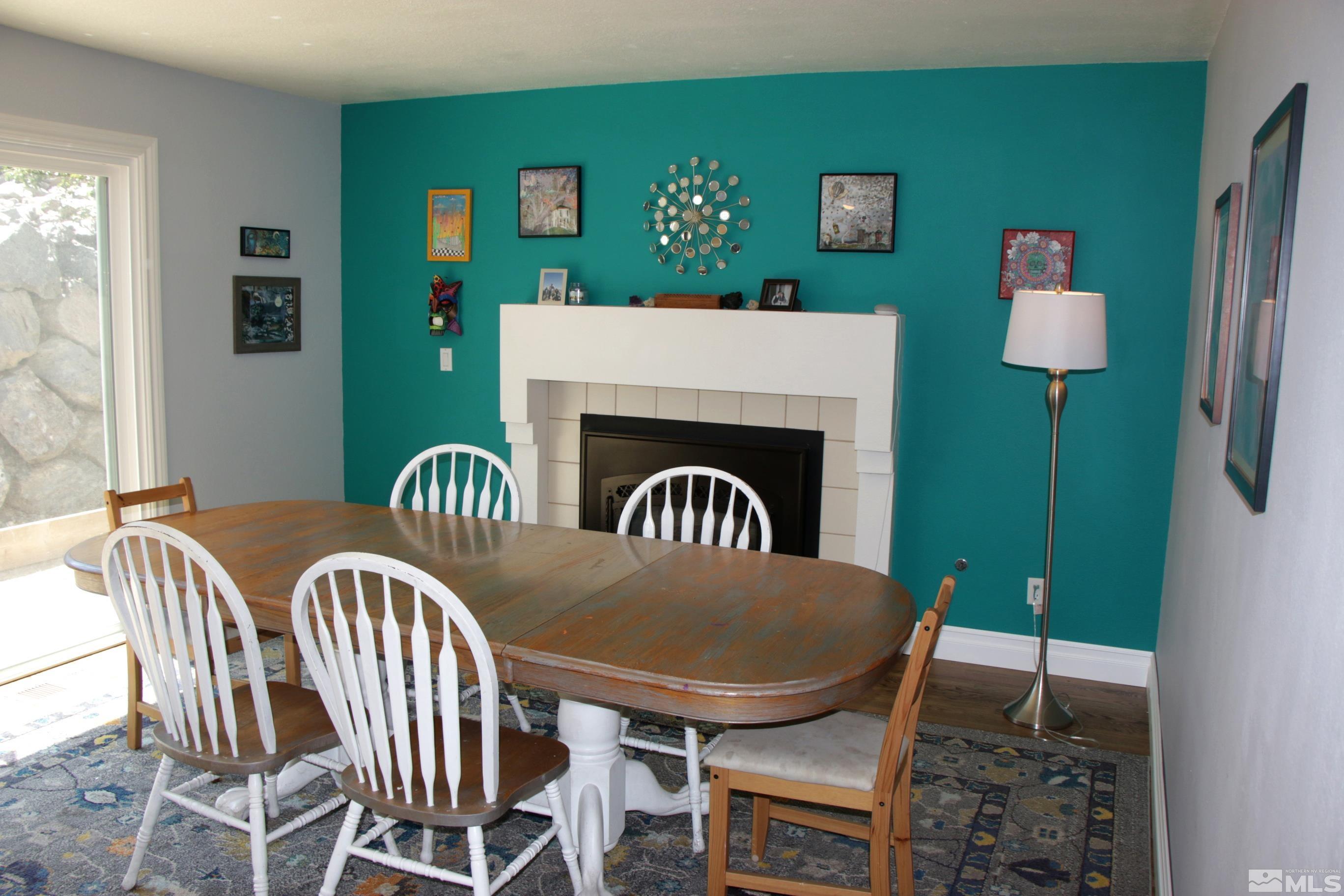 5330 Butterfly Court Reno, NV 89523 - Photo 7 of 34 a view of a dining room with furniture window and wooden floor