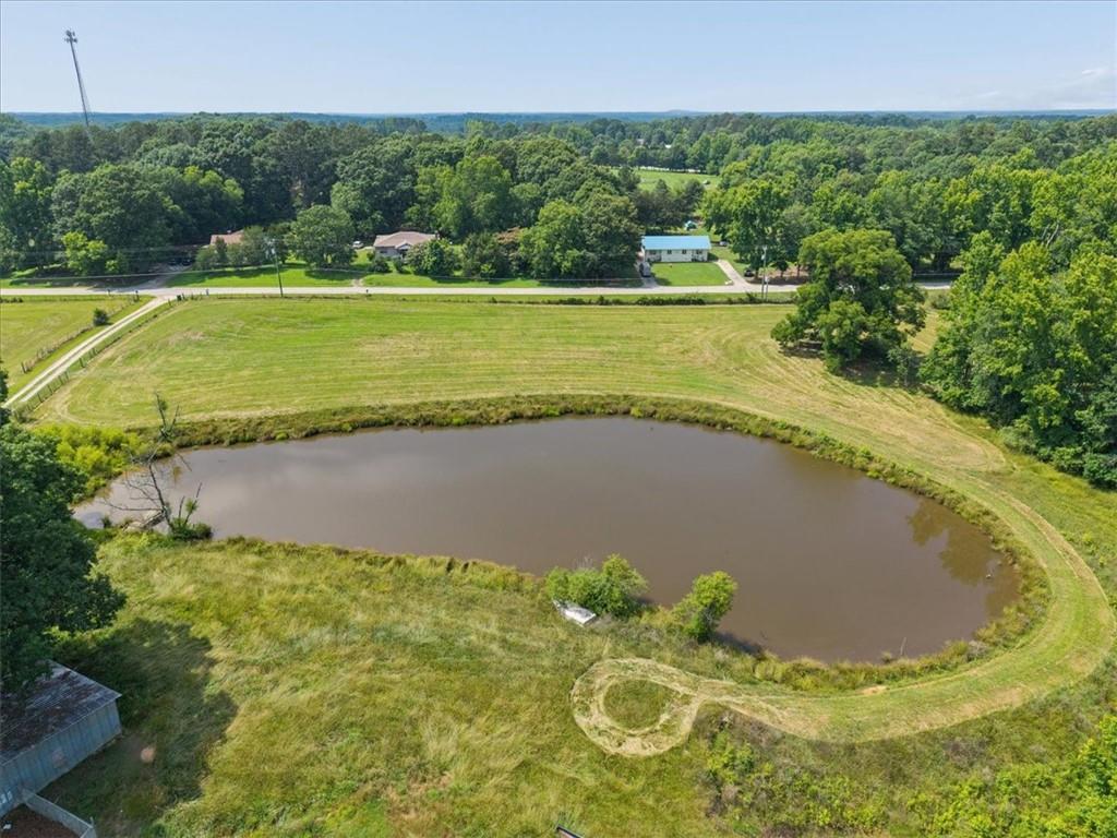 929 Nicholsville Road Monroe, GA 30656 - Photo 11 of 32 a view of a lake with a yard