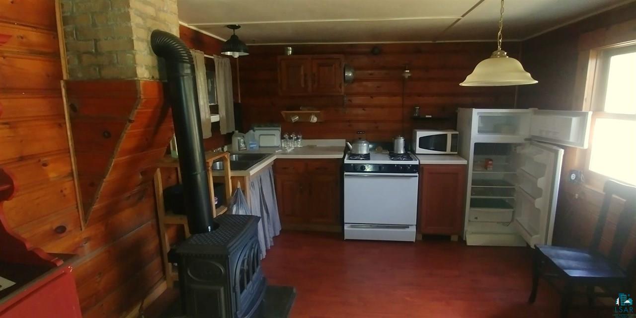 607-609 New Tomahawk Road Isabella, MN 55607 - Photo 8 of 36 Kitchen area Main Cabin