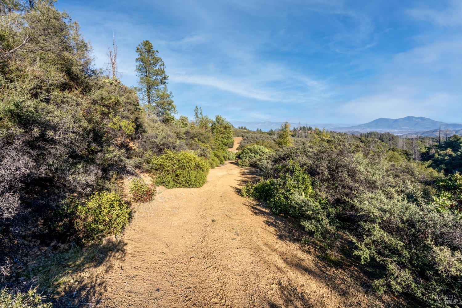 3681 Benmore Valley Road Hopland, CA 95449 - Photo 15 of 20 a view of a lake with a mountain