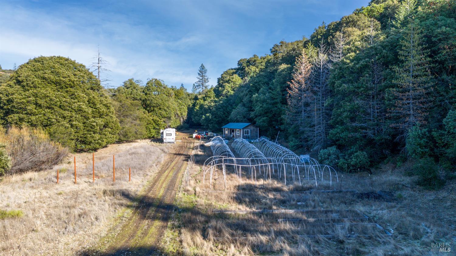 3681 Benmore Valley Road Hopland, CA 95449 - Photo 3 of 20 a view of a house with a yard
