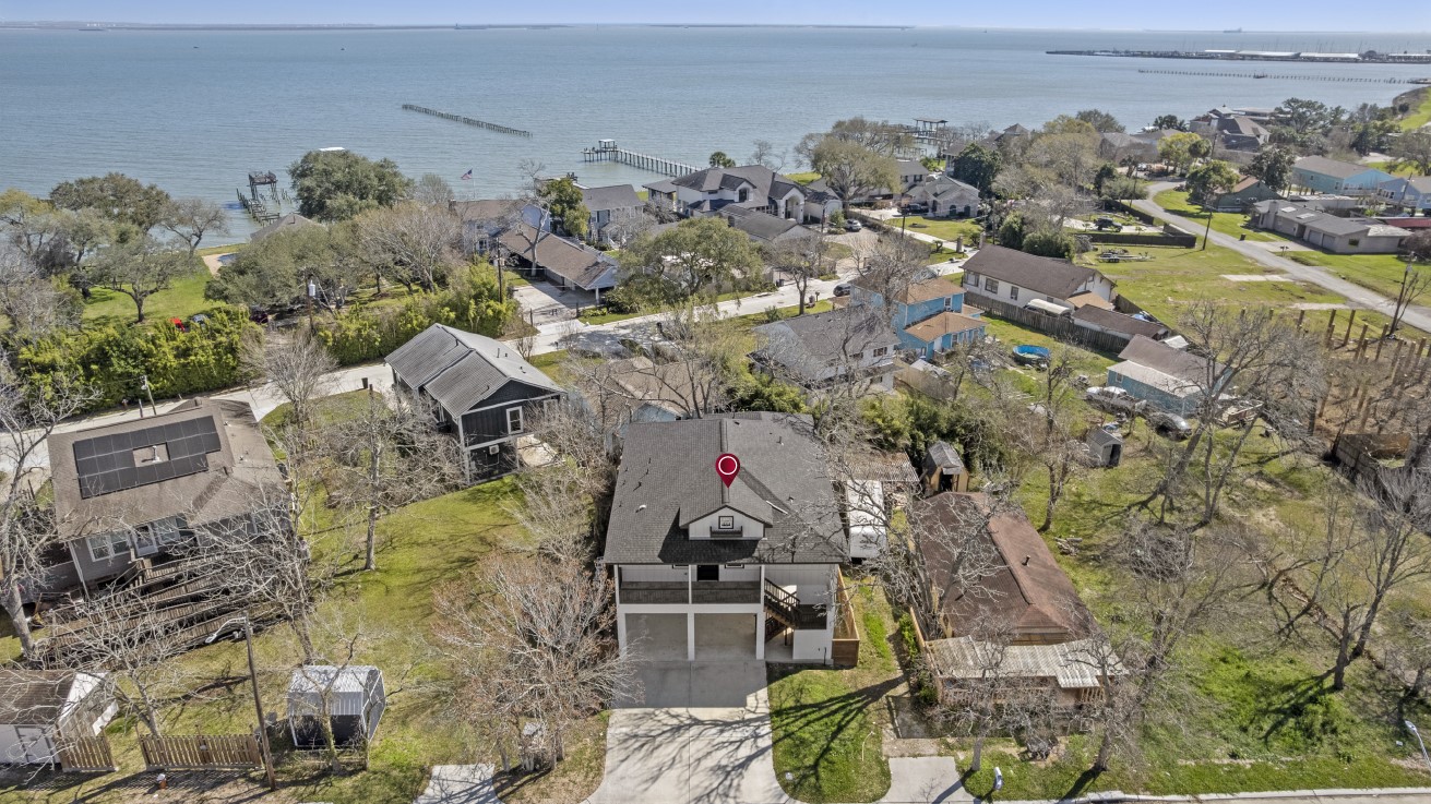 3133 Hamilton Street La Porte, TX 77571 - Photo 22 of 24 an aerial view of a house with a yard and ocean view