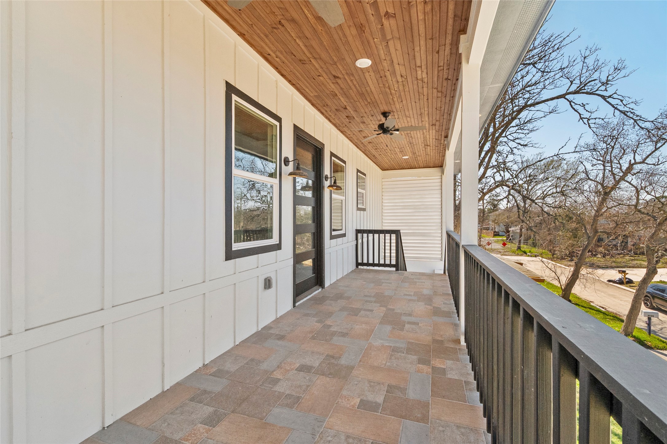 3133 Hamilton Street La Porte, TX 77571 - Photo 4 of 24 a view of a hallway with wooden cabinets and stairs