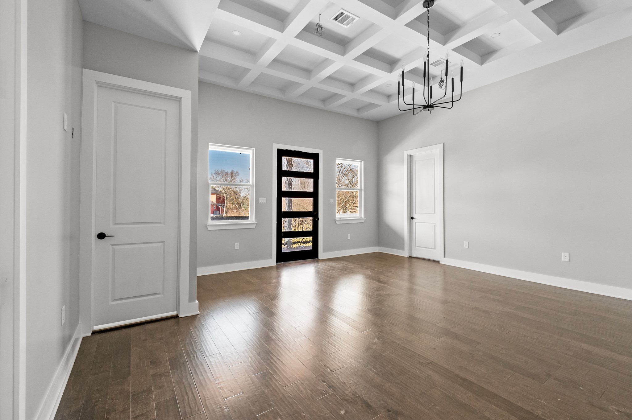 3133 Hamilton Street La Porte, TX 77571 - Photo 7 of 24 wooden floor in an empty room with a window
