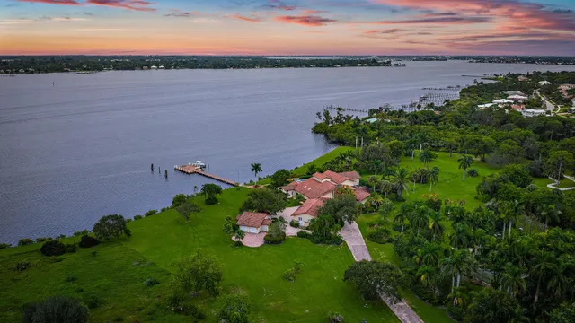 a front view of house with yard and outdoor seating