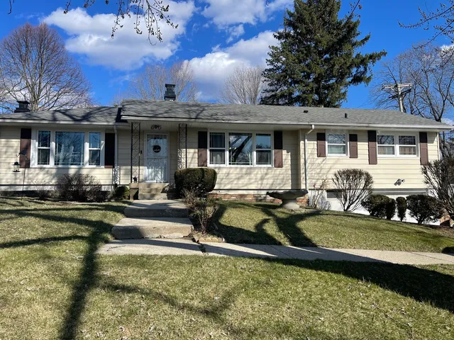 a front view of a house with swimming pool
