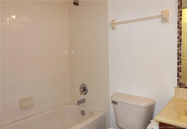 $250,000 | 3041 Southeast Lexington Lakes Drive, Unit 104, Stuart, FL 34994