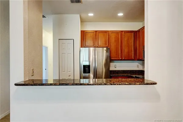 $250,000 | 3041 Southeast Lexington Lakes Drive, Unit 104, Stuart, FL 34994