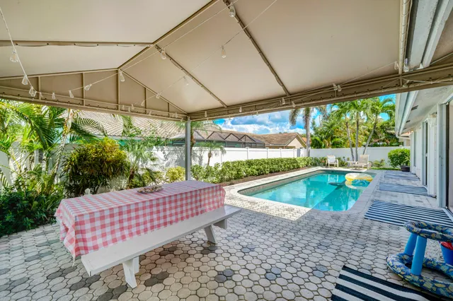 a view of outdoor space with swimming pool