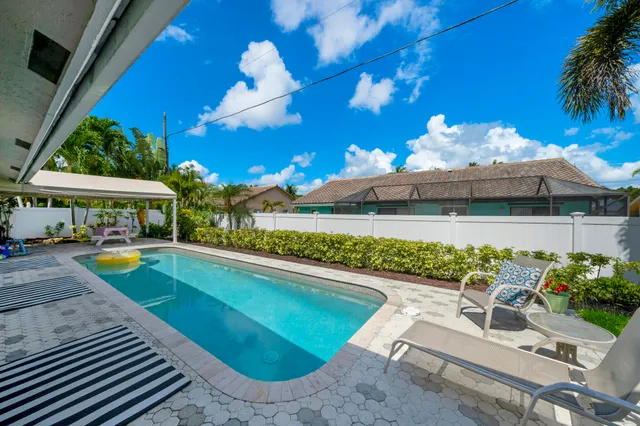 a view of a house with a swimming pool