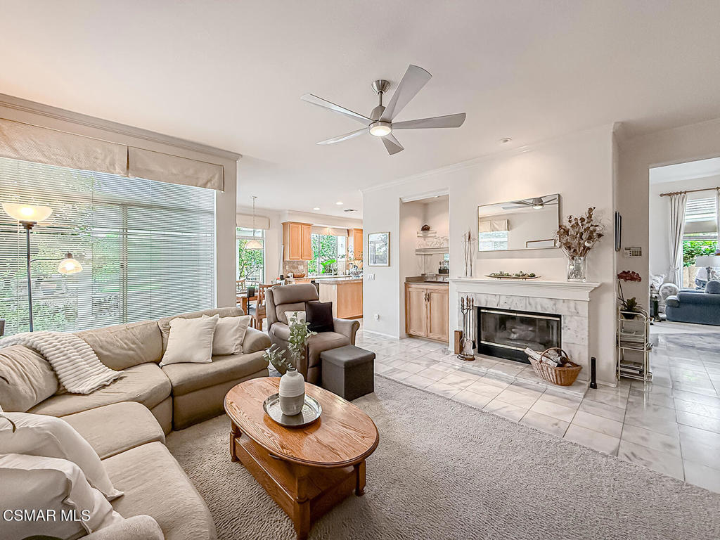 260 Sycamore Ridge Street Simi Valley, CA 93065 - Photo 18 of 58 a living room with furniture a fireplace and a large window