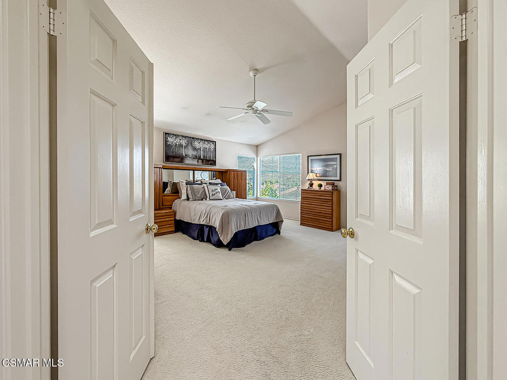 260 Sycamore Ridge Street Simi Valley, CA 93065 - Photo 32 of 58 a bedroom with furniture and white walls