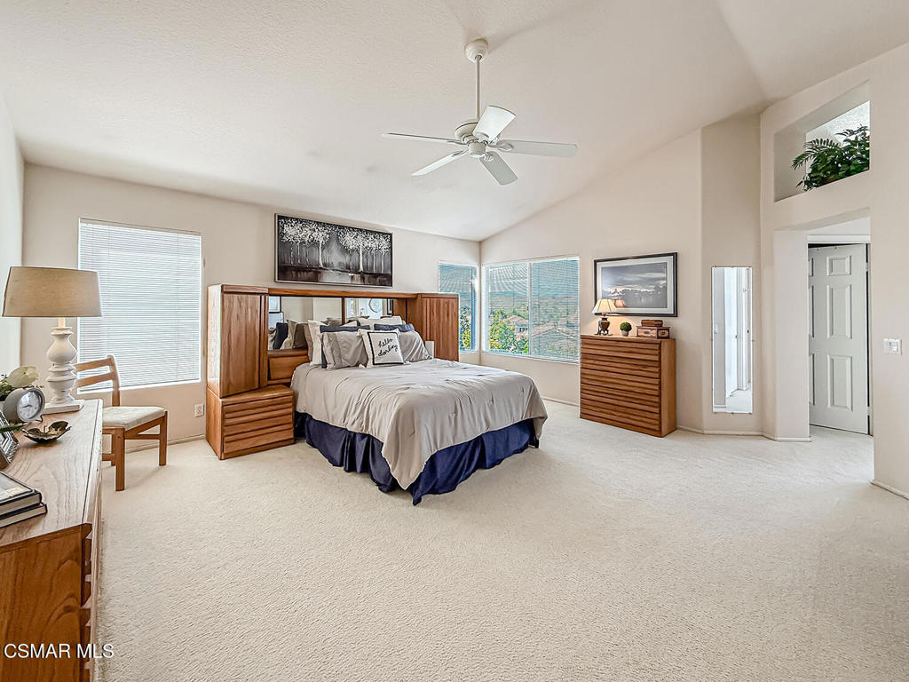 260 Sycamore Ridge Street Simi Valley, CA 93065 - Photo 33 of 58 a spacious bedroom with a bed and dresser